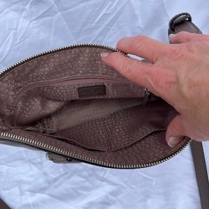 Kate spade purse. Tan in color. Good condition.